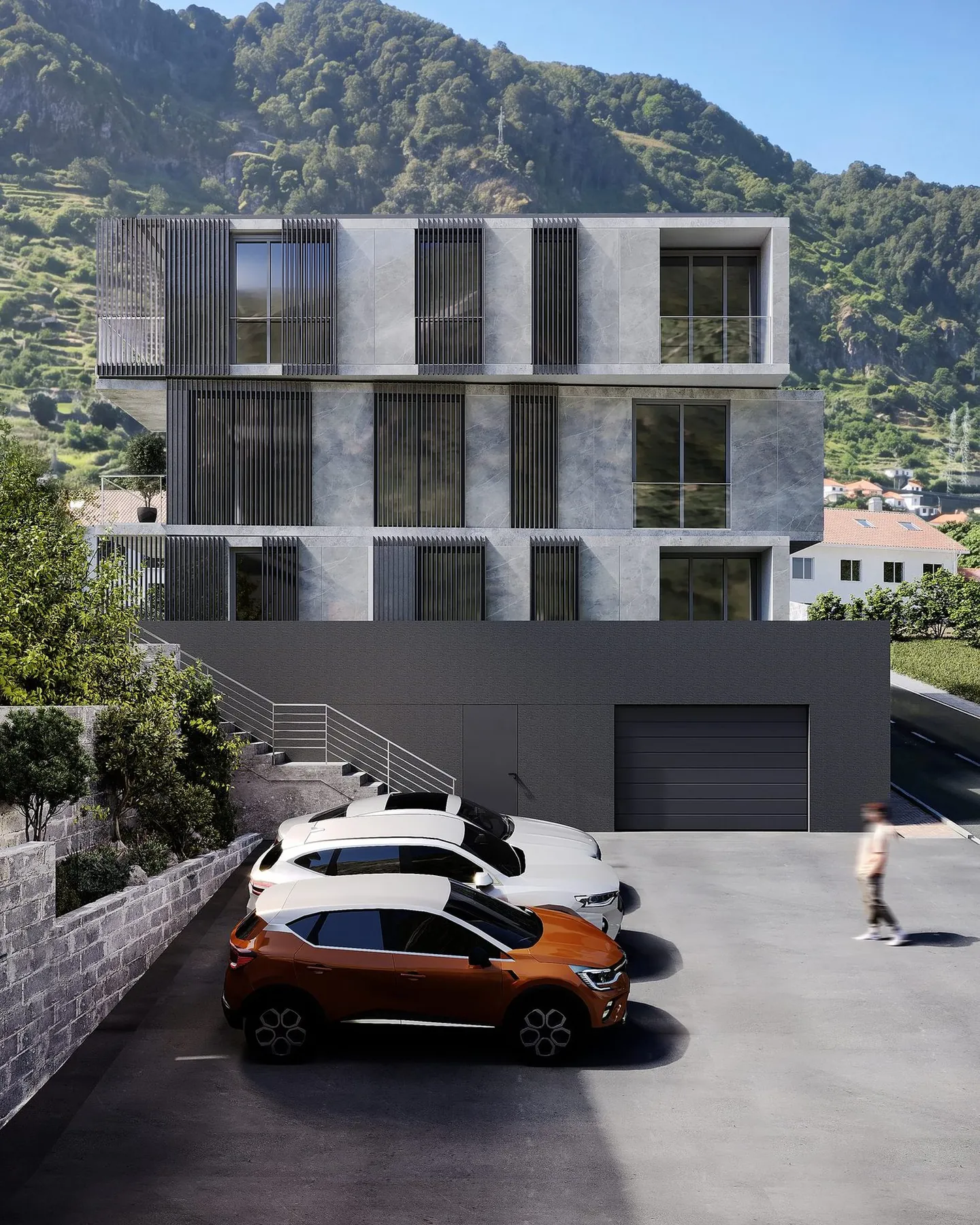 The street front of the house: dark plinth with the garage door and steps, grey stone floors above