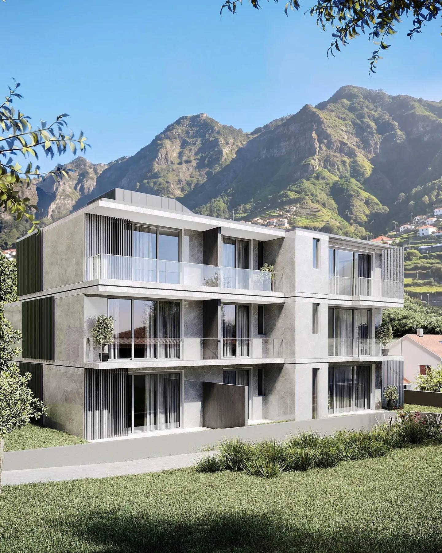 The garden side of the house with deep terraces behind glass balustrades