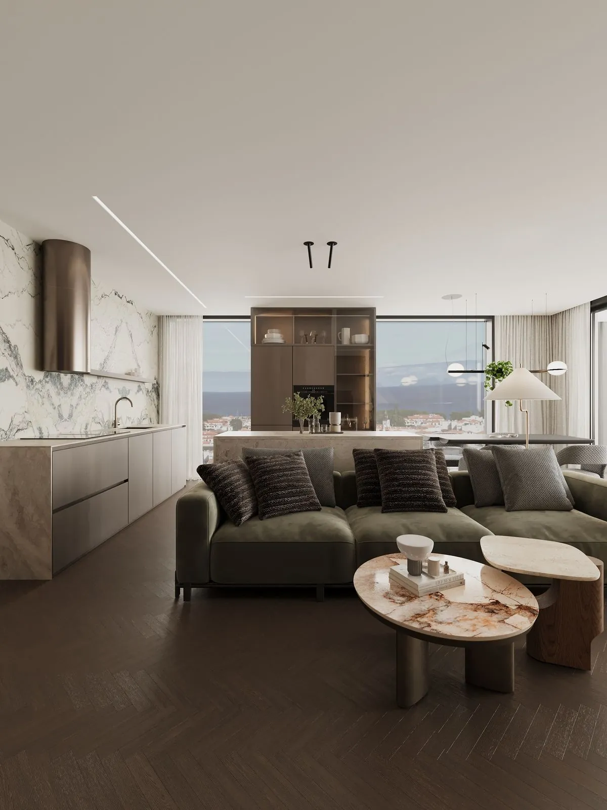 The kitchen wall in marble with a copper hood, the sofa and the view over the town