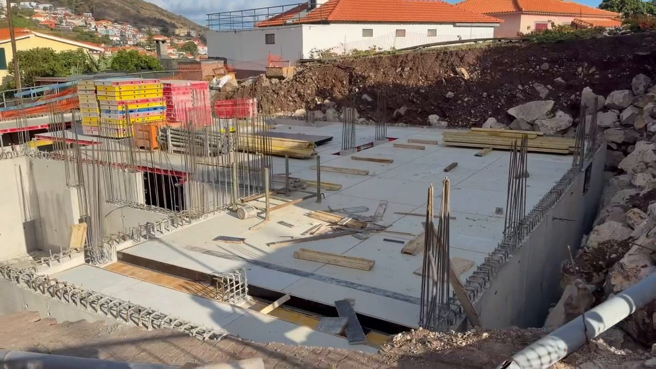 The slab over the garage level is cast